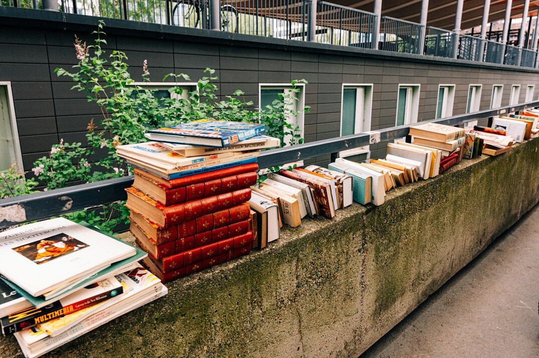 Stack of old hardcover books